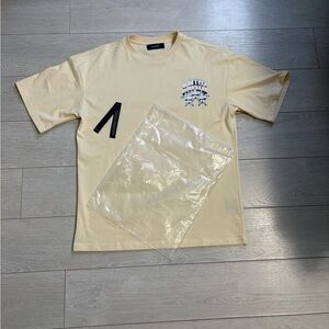 AMIRI Light Yellow Graphic Short Sleeve Tee